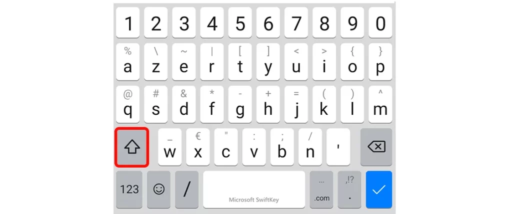 Clavier d'un téléphone portable android avec la touche majuscule mise en évidence en rouge